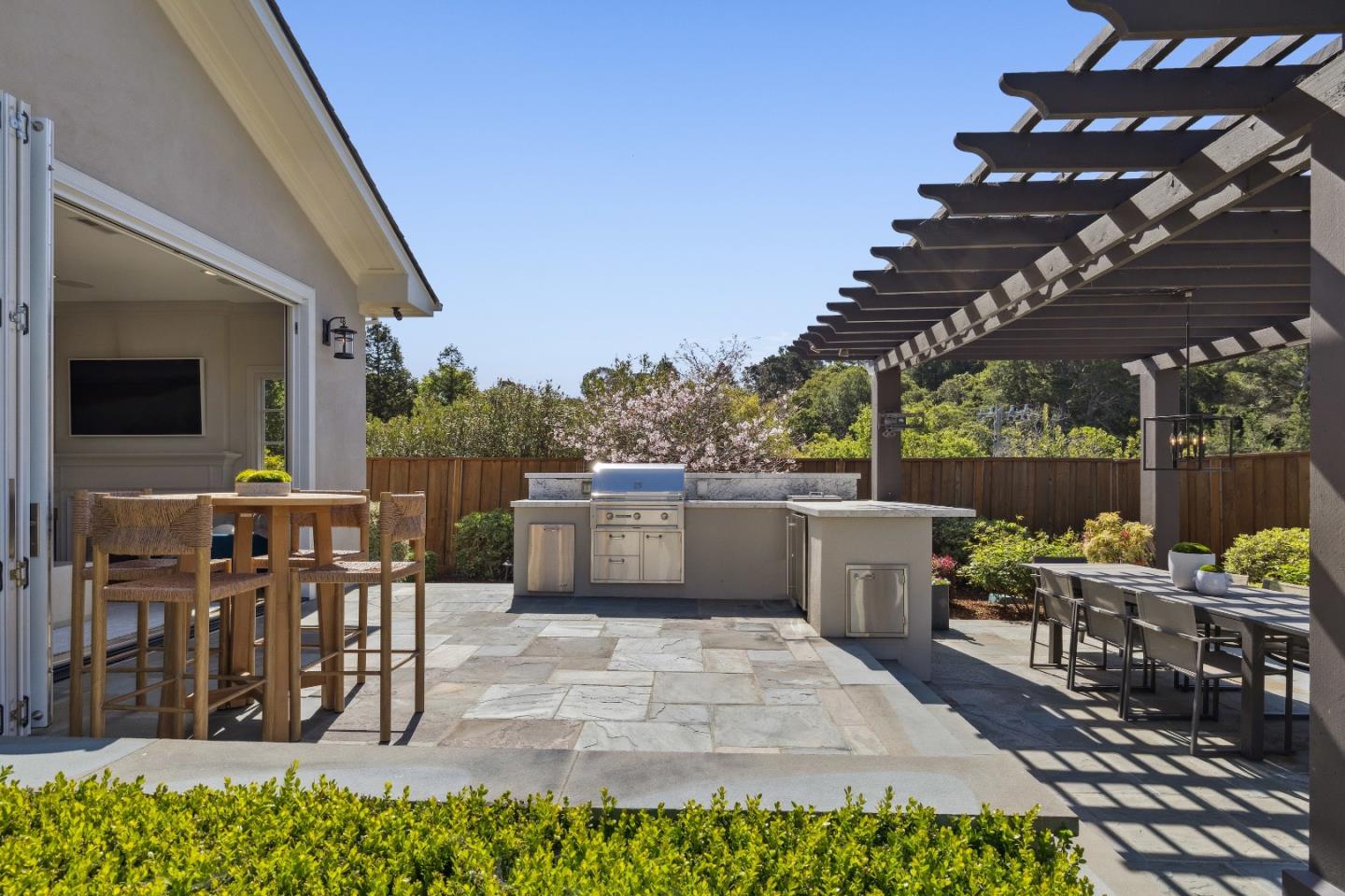 748 Jacaranda Circle Hillsborough, CA 94010 - Photo 17 of 41 a view of a patio with a table and chairs