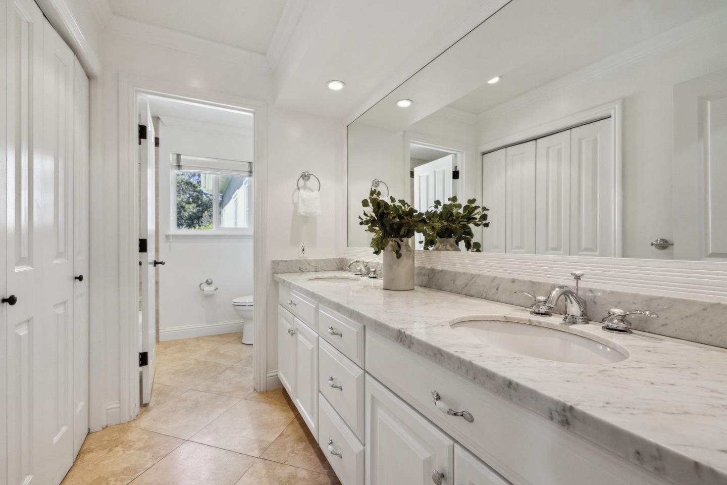 748 Jacaranda Circle Hillsborough, CA 94010 - Photo 21 of 41 a spacious bathroom with a granite countertop sink mirror and a toilet