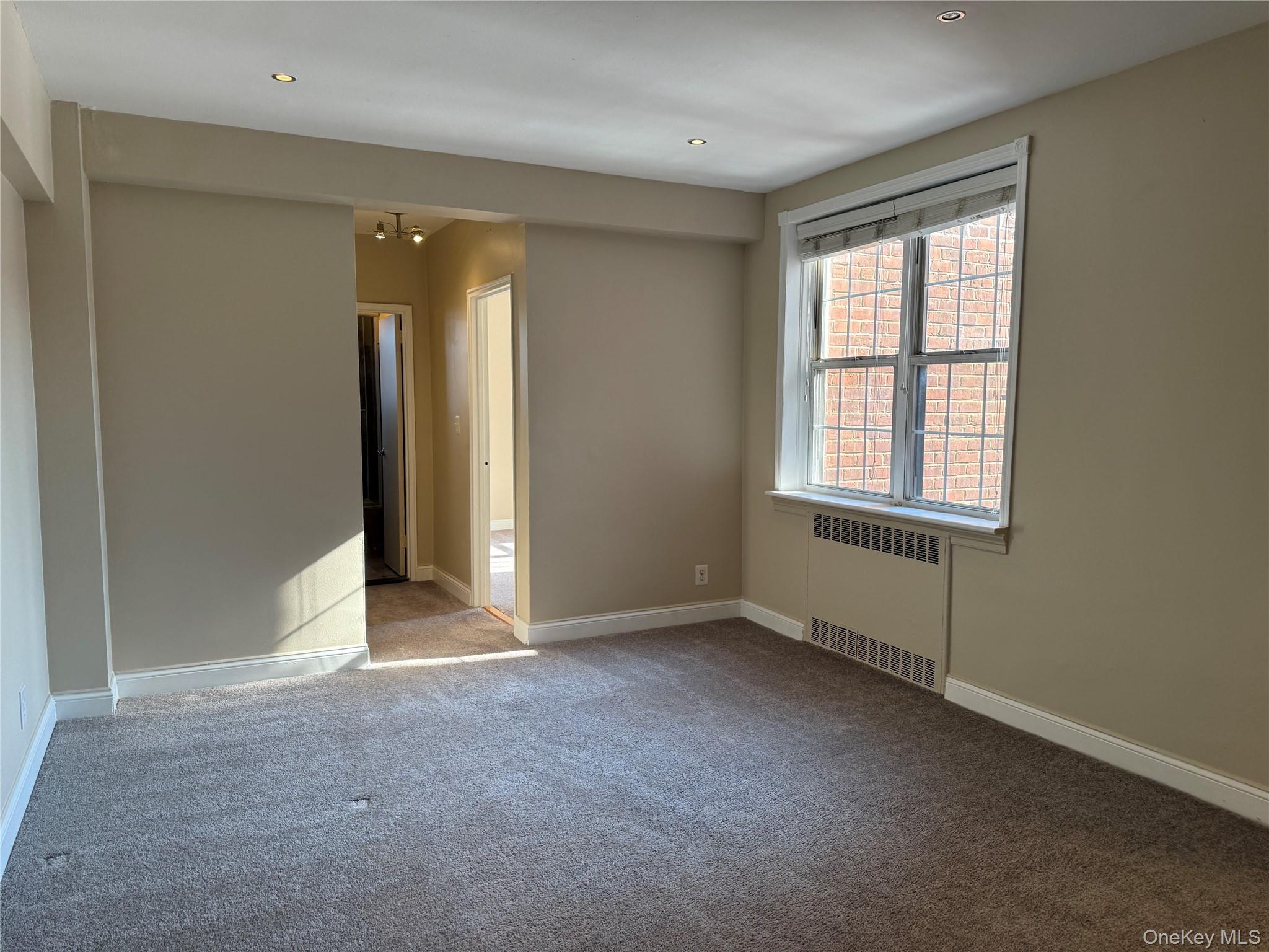 796 Bronx River Road, Unit B38 Bronxville, NY 10708 - Photo 21 of 31 an empty room with windows