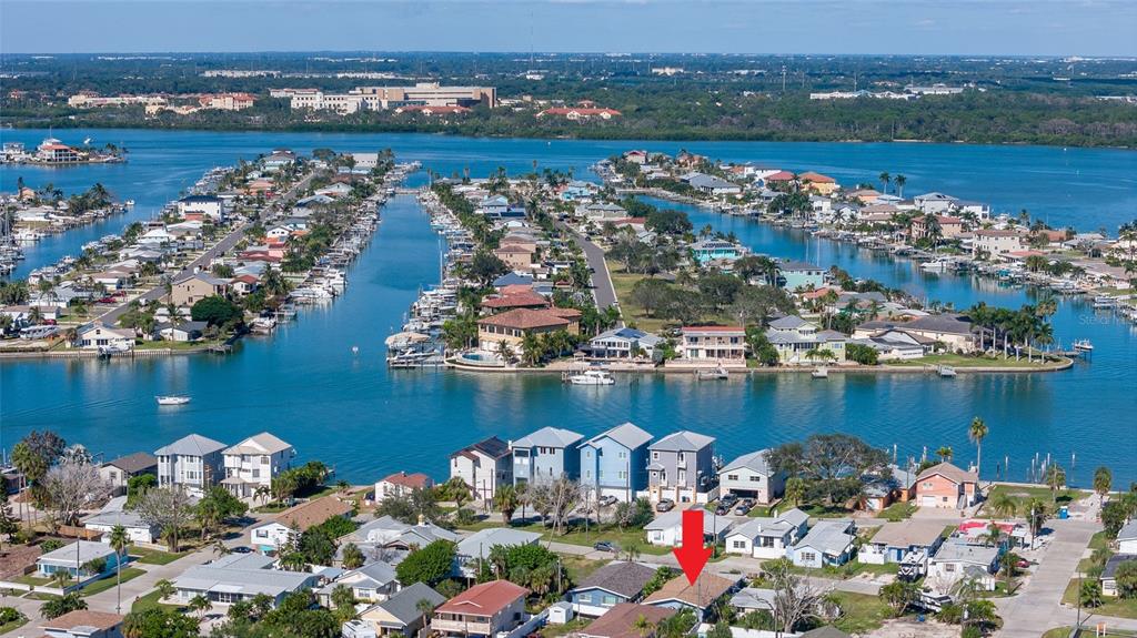 13246 4th Street East Madeira Beach, FL 33708 - Photo 3 of 23 an aerial view of a city