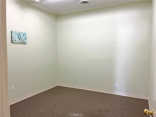 an empty room with a door