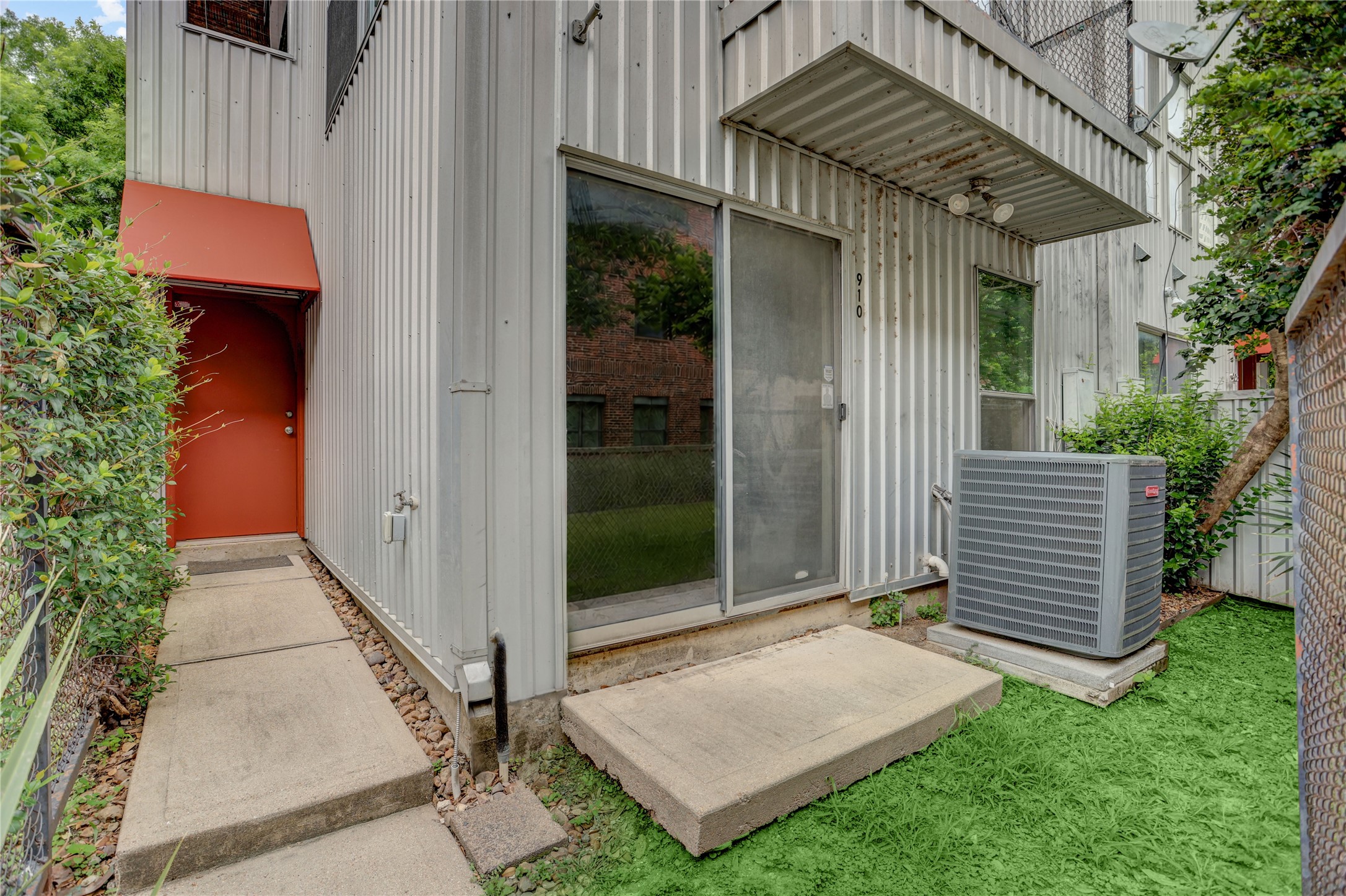910 Ruthven Street Houston, TX 77019 - Photo 2 of 35 Contemporary vibe of aluminum siding and Bold accent colors.