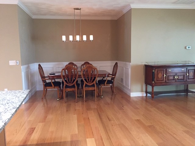 41 Breakneck Hill Road, Unit 3 Lincoln, RI 02865 - Photo 17 of 22 DINING AREA WITH UPSCALE LIGHTING & WAINSCOTING
