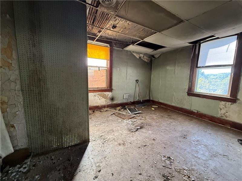 189 Beaver Street Leetsdale, PA 15056 - Photo 6 of 14 a view of empty room with windows
