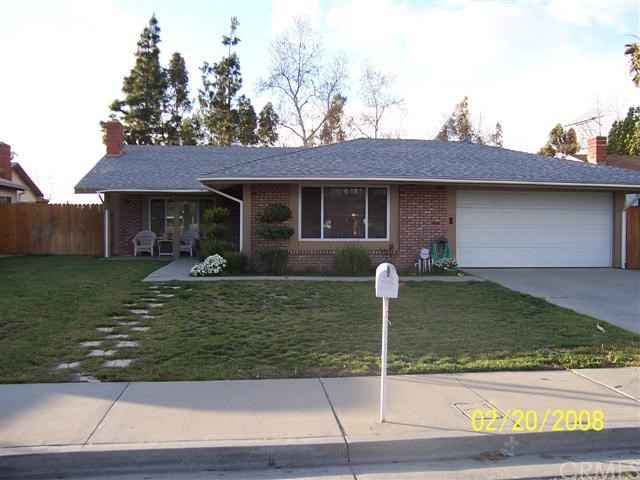 8525 Limestone Drive Riverside, CA 92504 - Photo 1 of 1 a front view of a house with garden