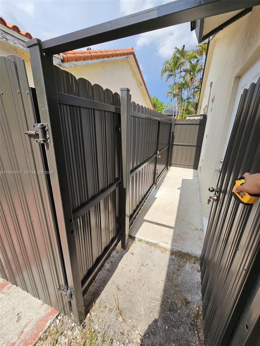 10825 Southwest 145th Place, Unit 2 Miami, FL 33186 - Photo 5 of 6 a view of entryway