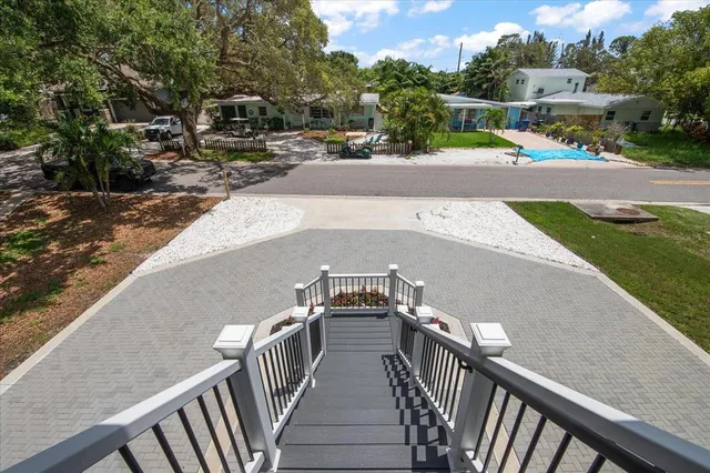 a view of balcony with furniture