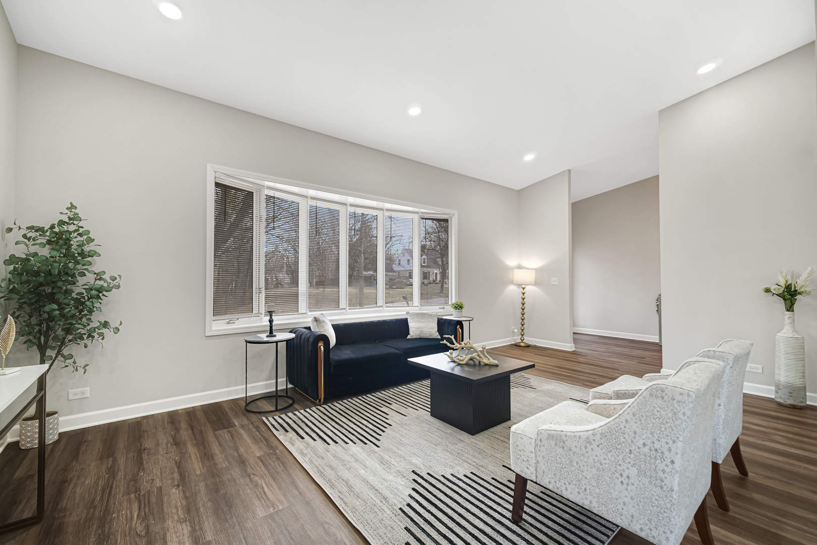 30 Cornwall Drive Crete, IL 60417 - Photo 6 of 44 a living room with furniture a large window and a table
