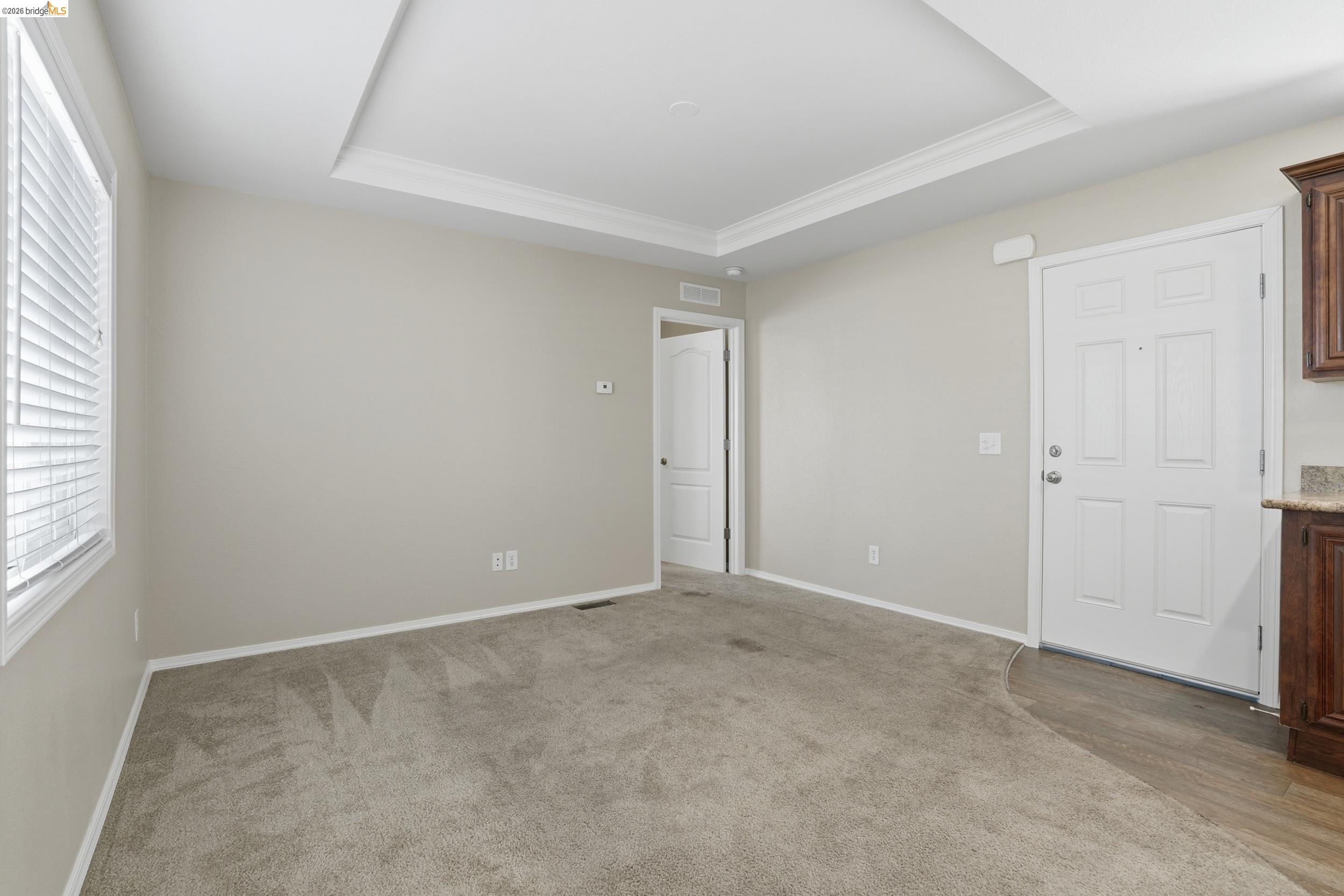 360 East Grant Line Road, Unit SPC 18 Tracy, CA 95376 - Photo 11 of 31 an empty room with windows