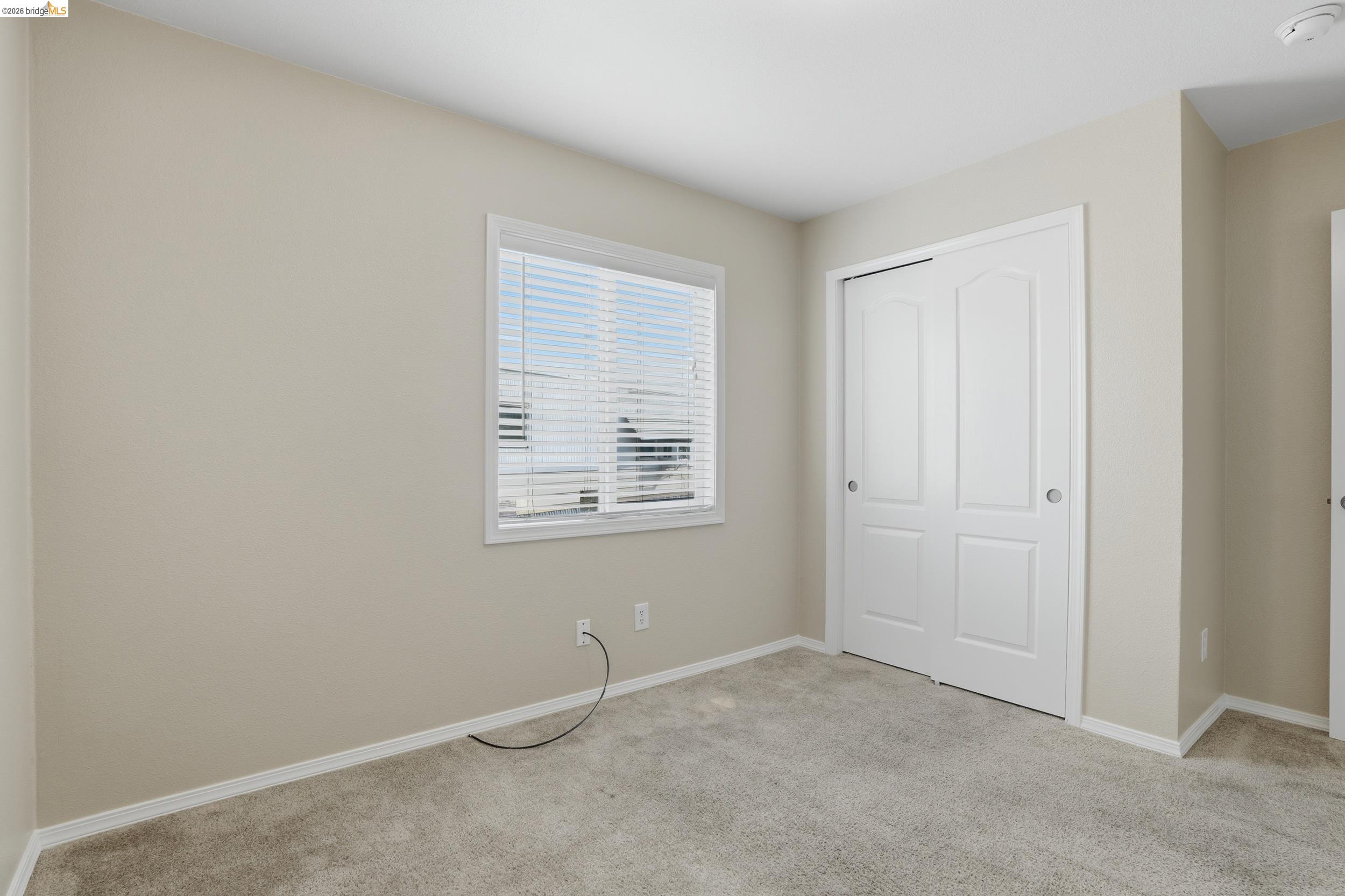 360 East Grant Line Road, Unit SPC 18 Tracy, CA 95376 - Photo 16 of 31 an empty room with windows