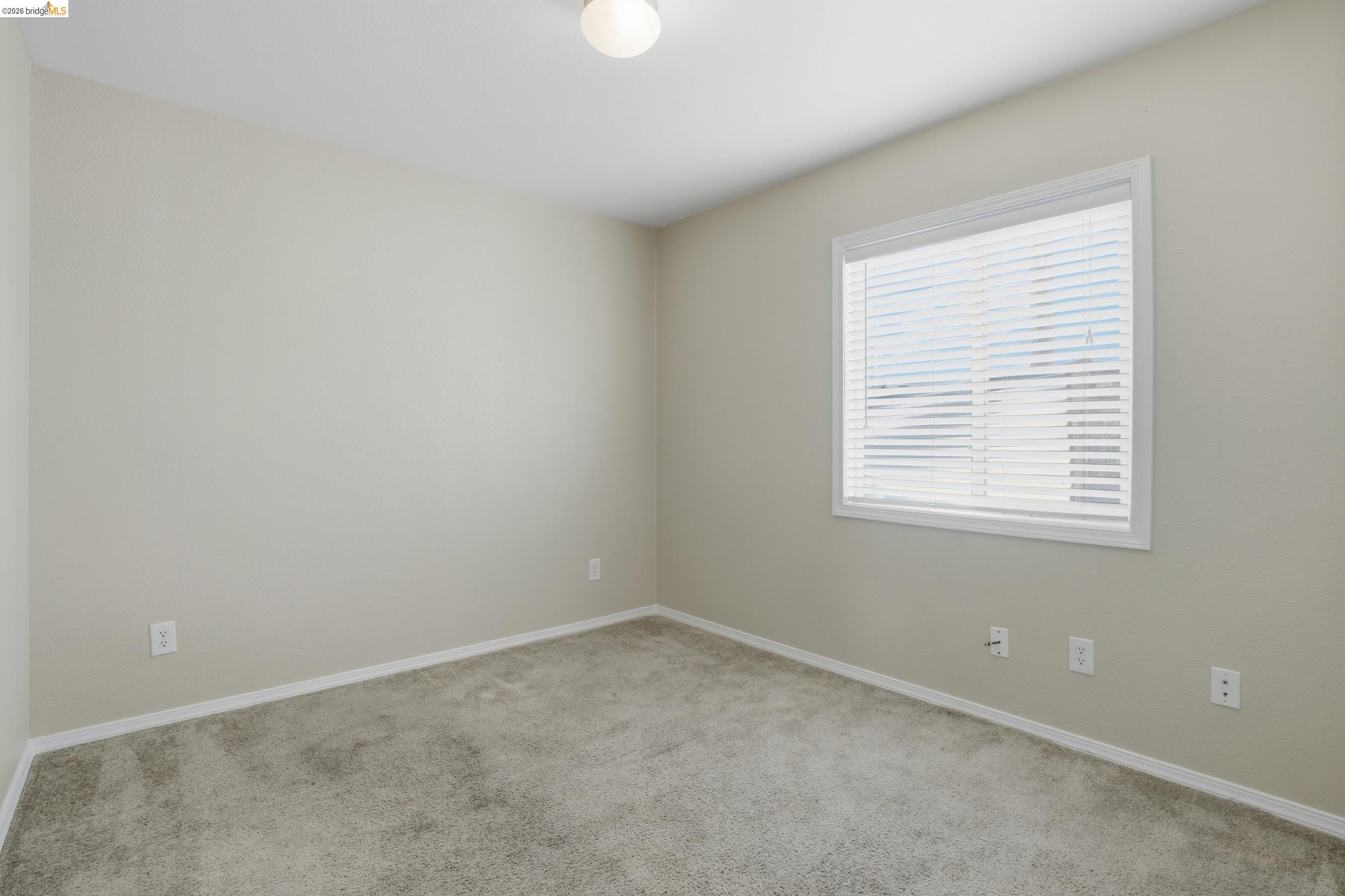360 East Grant Line Road, Unit SPC 18 Tracy, CA 95376 - Photo 19 of 31 an empty room with a window
