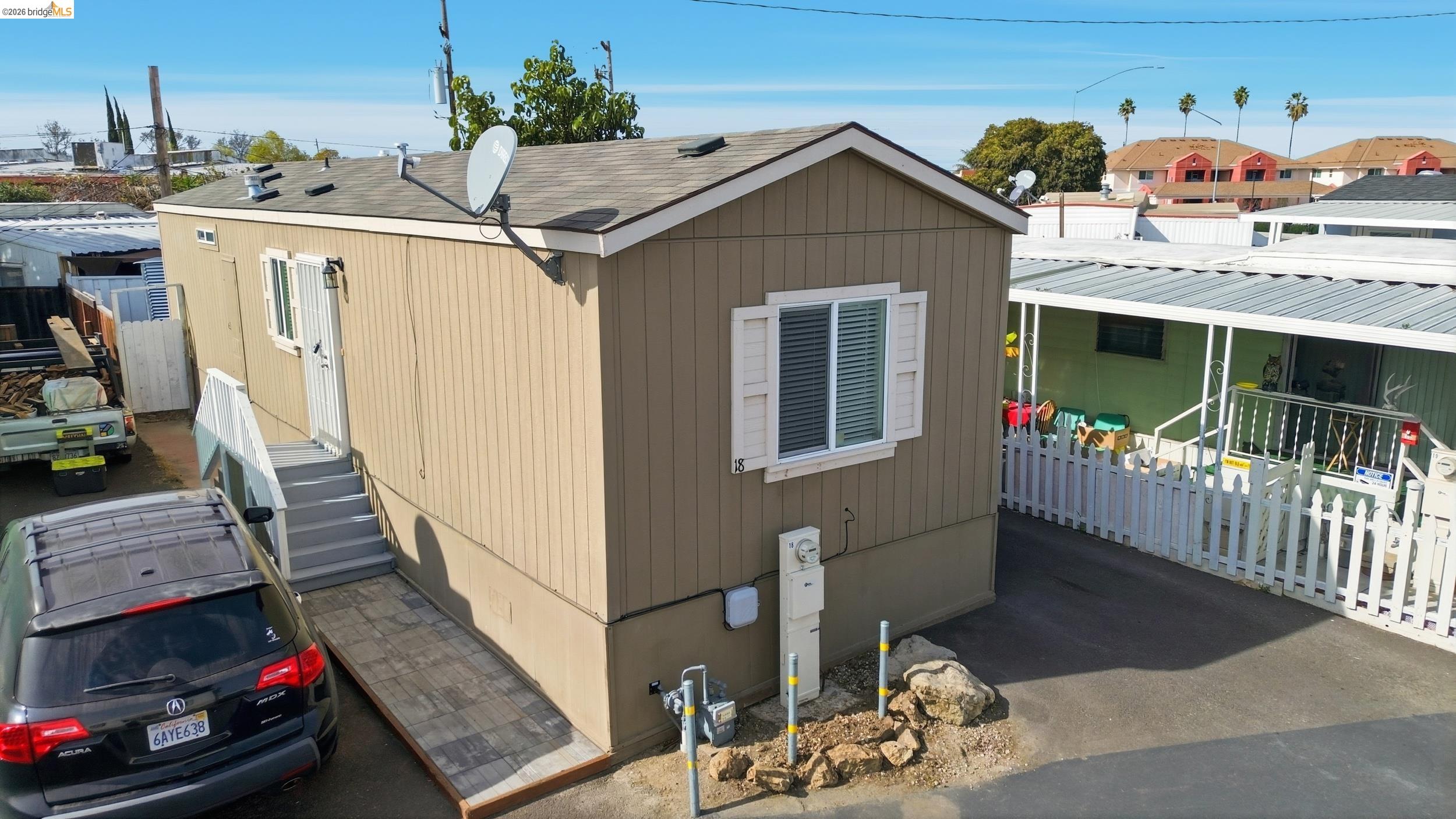 360 East Grant Line Road, Unit SPC 18 Tracy, CA 95376 - Photo 22 of 31 a view of a house with entrance gate