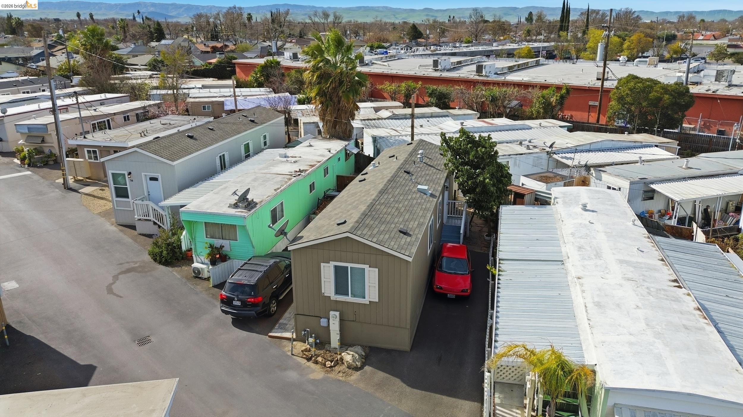360 East Grant Line Road, Unit SPC 18 Tracy, CA 95376 - Photo 25 of 31 an aerial view of a house with a yard