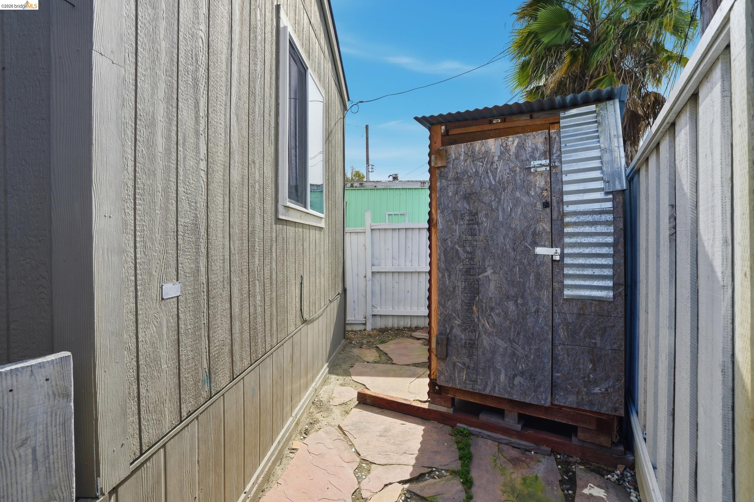 360 East Grant Line Road, Unit SPC 18 Tracy, CA 95376 - Photo 31 of 31 a view of a house with a backyard