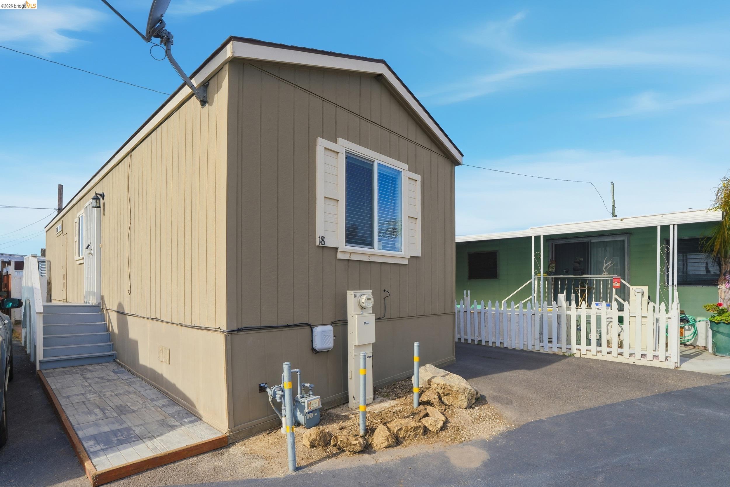 360 East Grant Line Road, Unit SPC 18 Tracy, CA 95376 - Photo 6 of 31 a view of back yard of the house