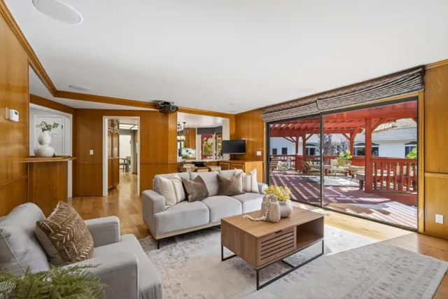 a bed room with furniture and a window