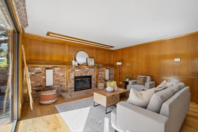 a bed room with a bed and a large window