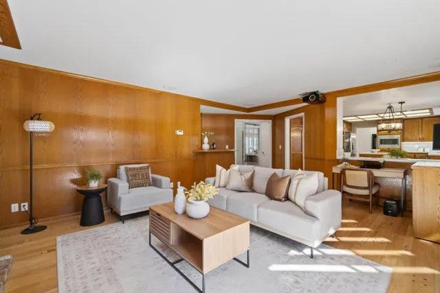 a bathroom with double vanity sink and a mirror