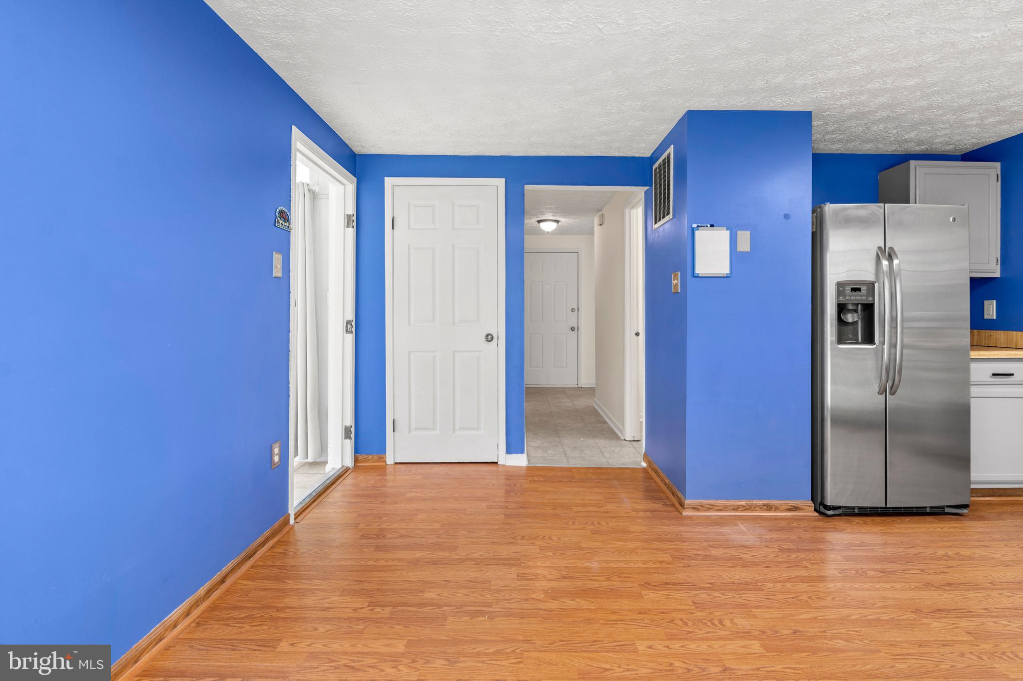 3520 Upton Road Baltimore, MD 21234 - Photo 15 of 39 a view of a kitchen with stainless steel appliances wooden floor and a kitchen