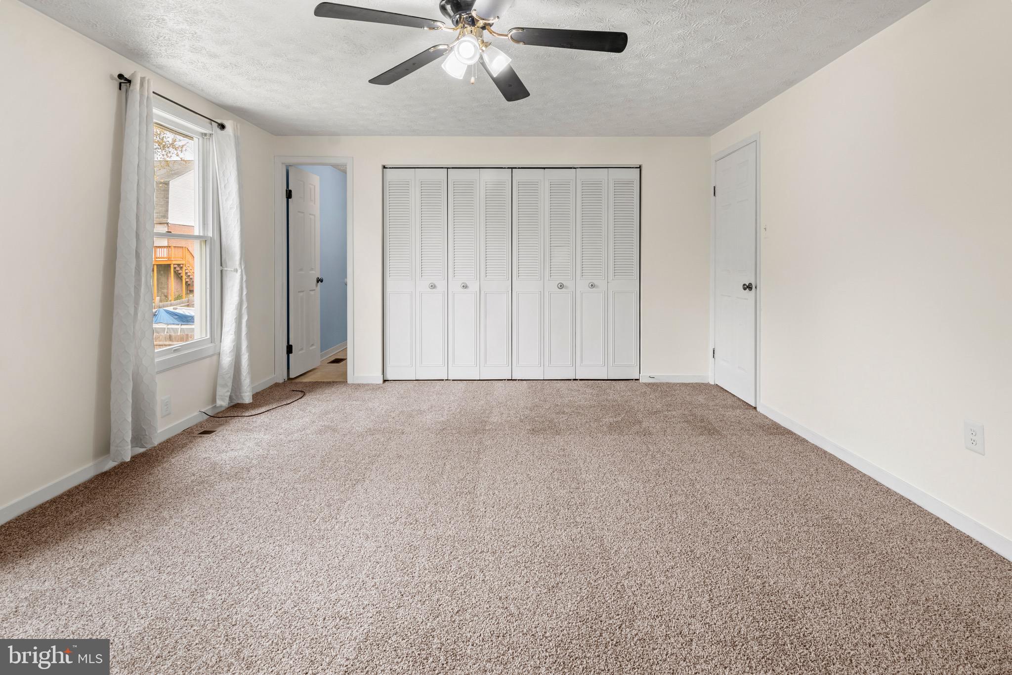 3520 Upton Road Baltimore, MD 21234 - Photo 23 of 39 a view of an empty room and chandelier fan