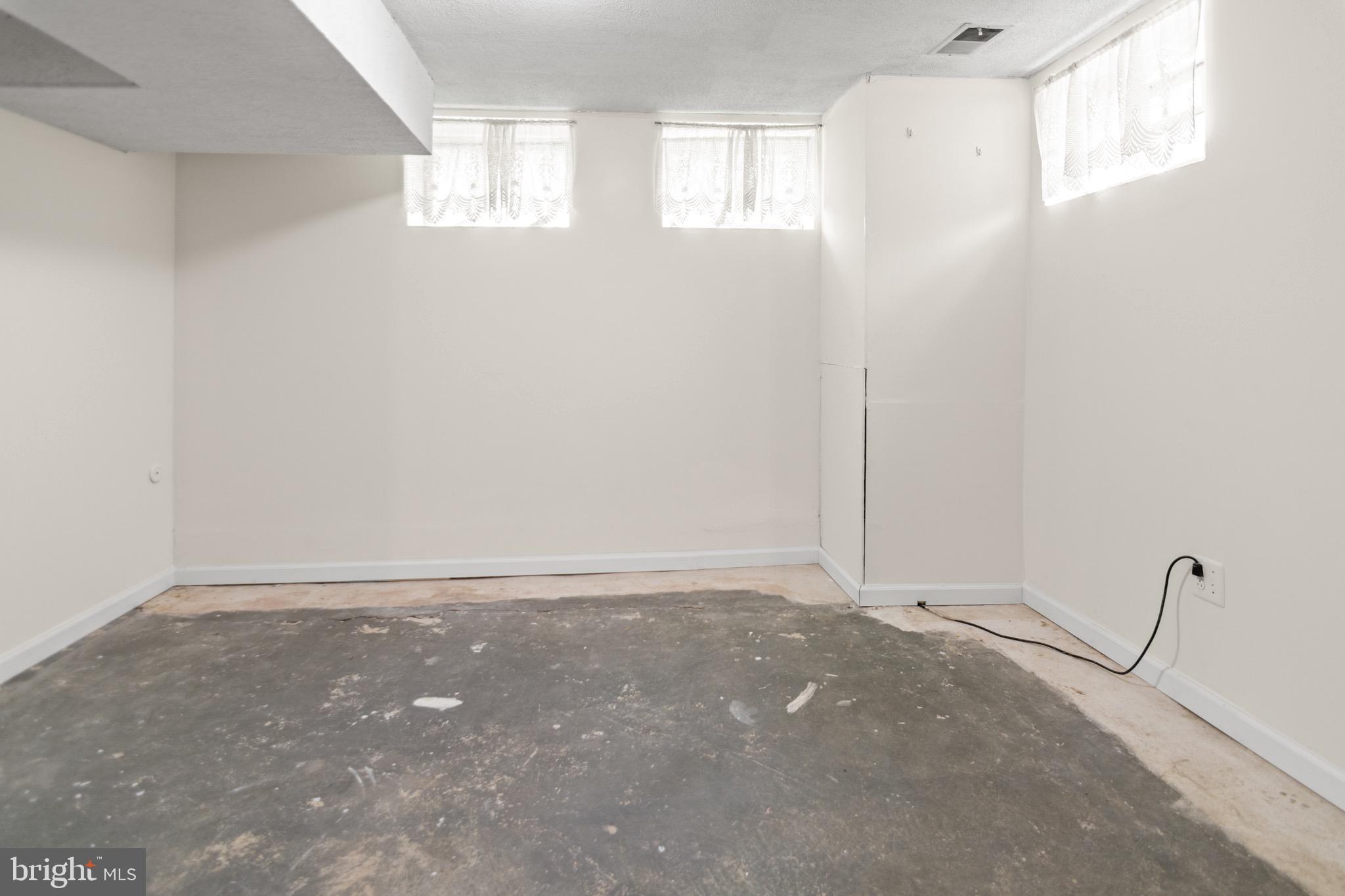 3520 Upton Road Baltimore, MD 21234 - Photo 30 of 39 a view of an empty room with windows