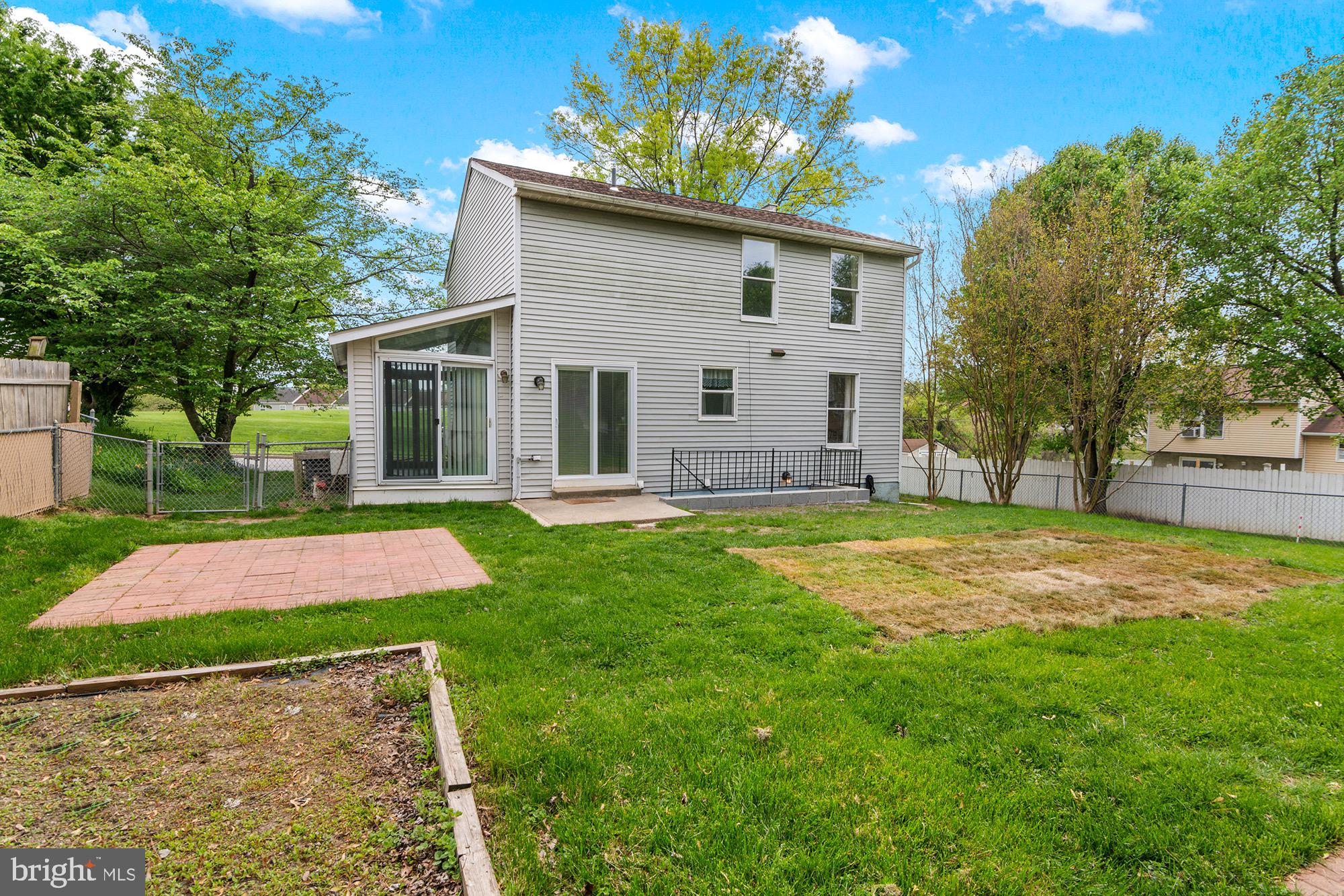 3520 Upton Road Baltimore, MD 21234 - Photo 35 of 39 a front view of house with yard and green space