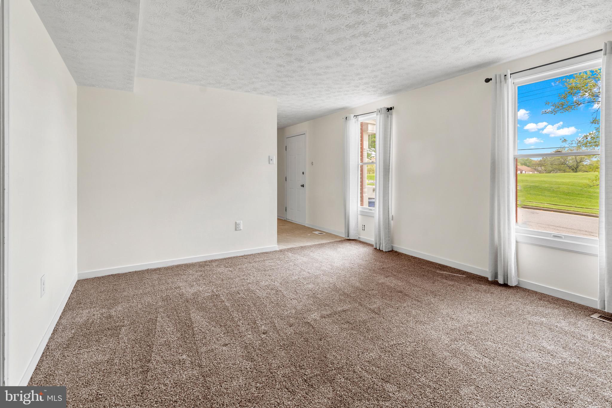 3520 Upton Road Baltimore, MD 21234 - Photo 6 of 39 a view of an empty room with a window