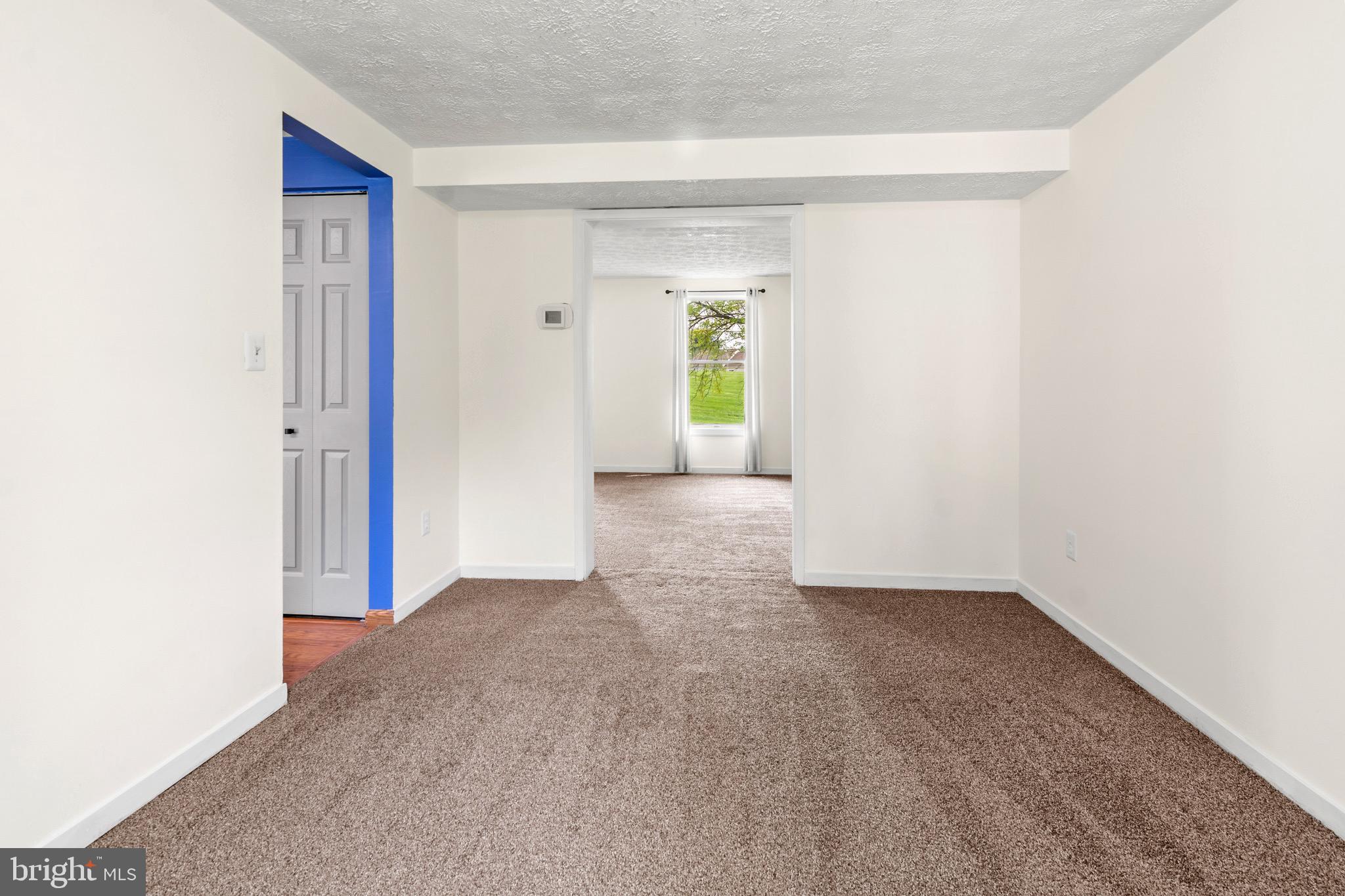 3520 Upton Road Baltimore, MD 21234 - Photo 8 of 39 a view of an empty room with a window