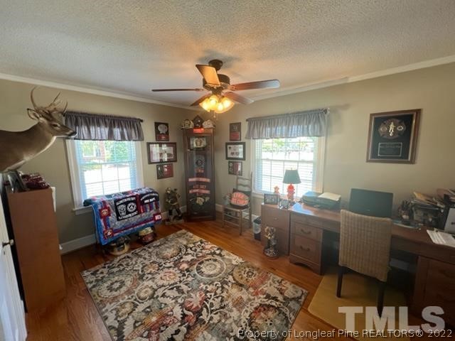 406 Old Post Road Erwin, NC 28339 - Photo 15 of 30 a living room with furniture and a window