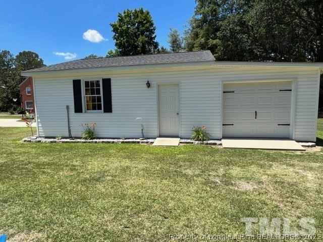 406 Old Post Road Erwin, NC 28339 - Photo 23 of 30 a backyard of a house