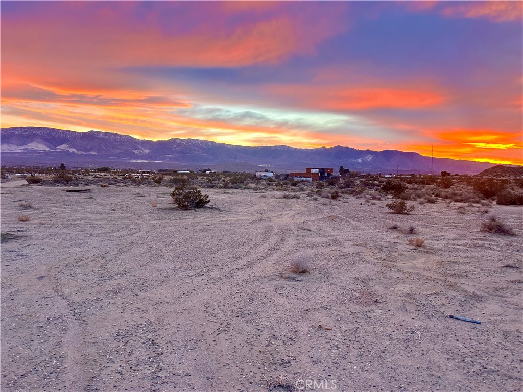 40 Rodeo Lucerne Valley Lucerne Valley, CA 92356 - Photo 2 of 3 a view of an outdoor space and mountain view