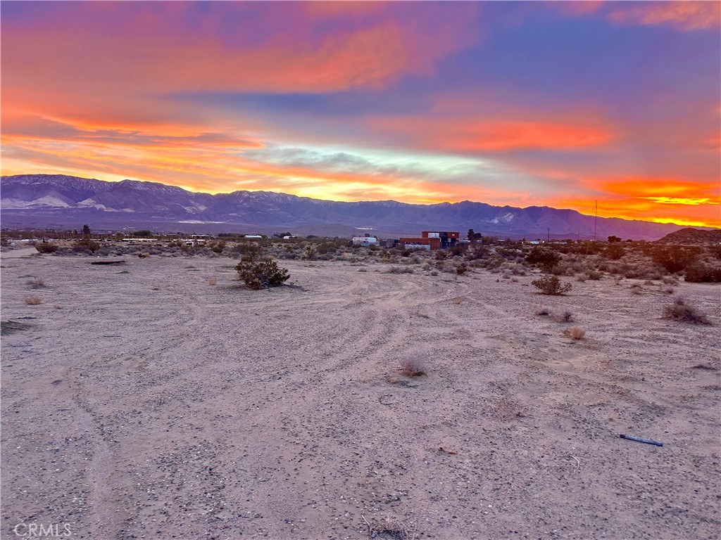 40 Rodeo Lucerne Valley Lucerne Valley, CA 92356 - Photo 2 of 10 a view of an outdoor space and mountain view