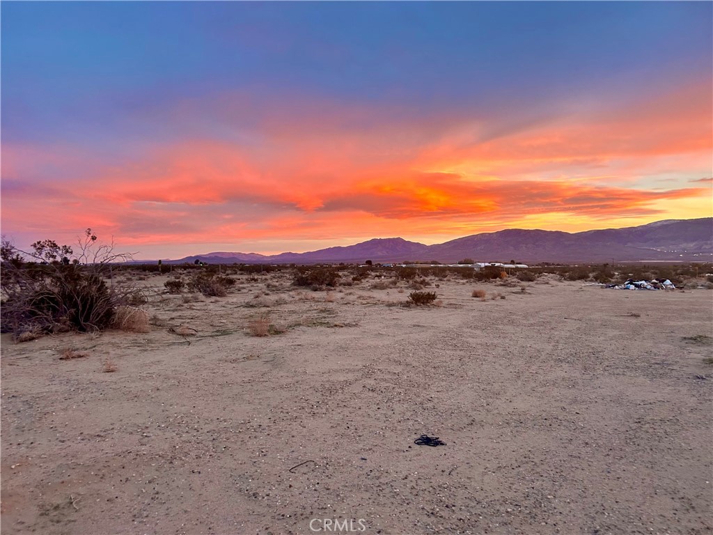 40 Rodeo Lucerne Valley Lucerne Valley, CA 92356 - Photo 3 of 3 a view of a lake in a field