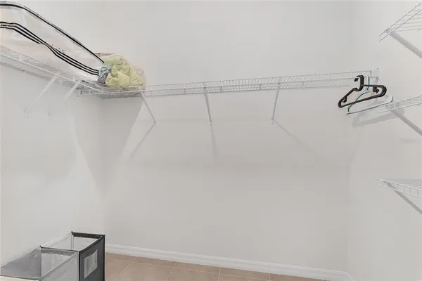 a bedroom with a bed and a cabinets