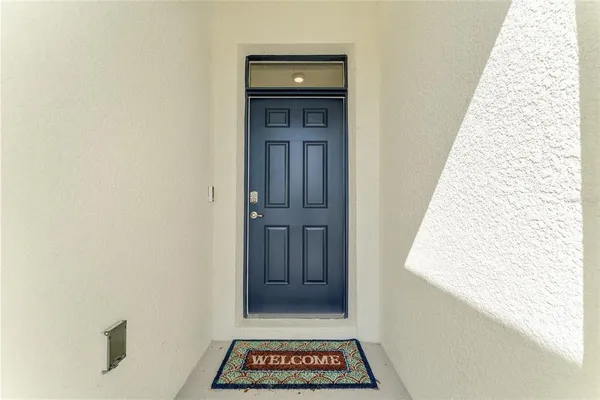 a view of a living room with a wooden floor