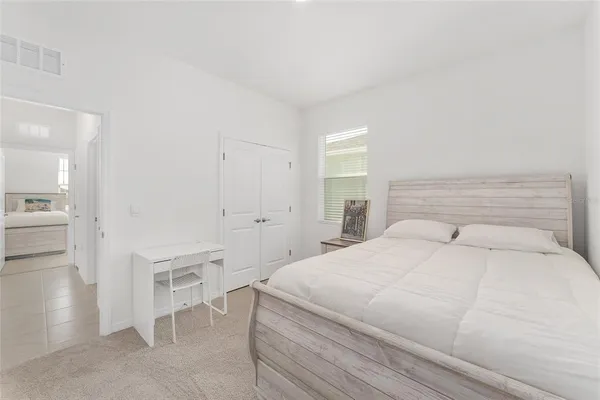 a view of a patio with a table and chairs