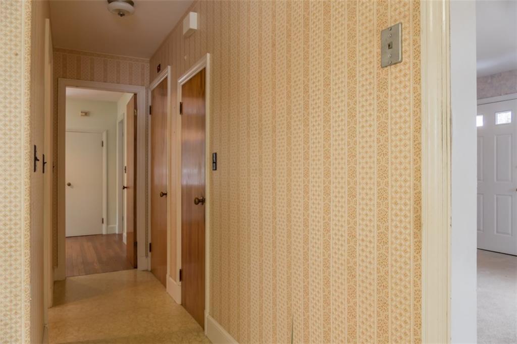 26 Collinsbrook Road Brunswick, ME 04011 - Photo 9 of 35 Hallway off the kitchen leading to...