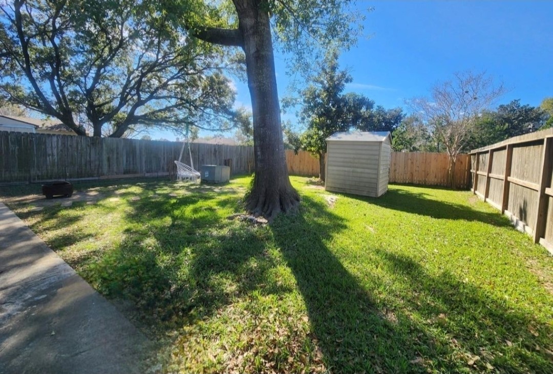 13715 Vickston Lane Houston, TX 77014 - Photo 11 of 11 a view of a back yard