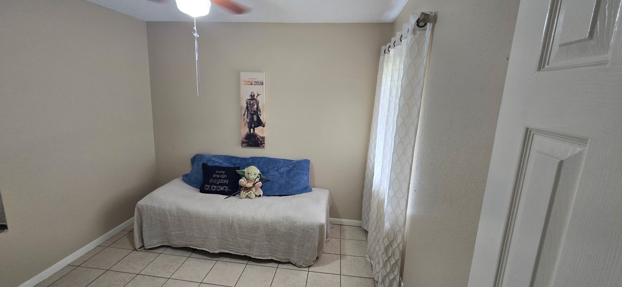 13715 Vickston Lane Houston, TX 77014 - Photo 4 of 11 a bedroom with a bed and a window