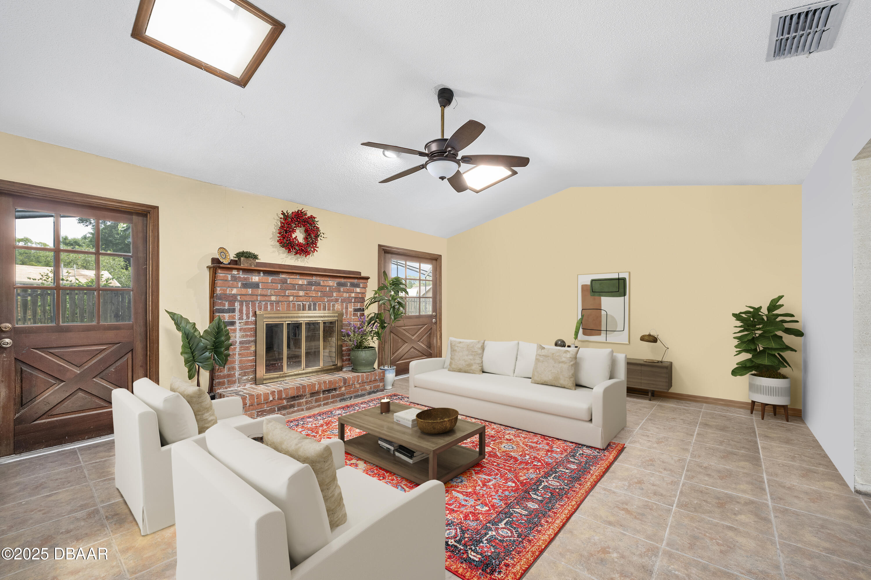 1 River Bluff Court Ormond Beach, FL 32174 - Photo 13 of 58 a living room with furniture a fireplace and a chandelier