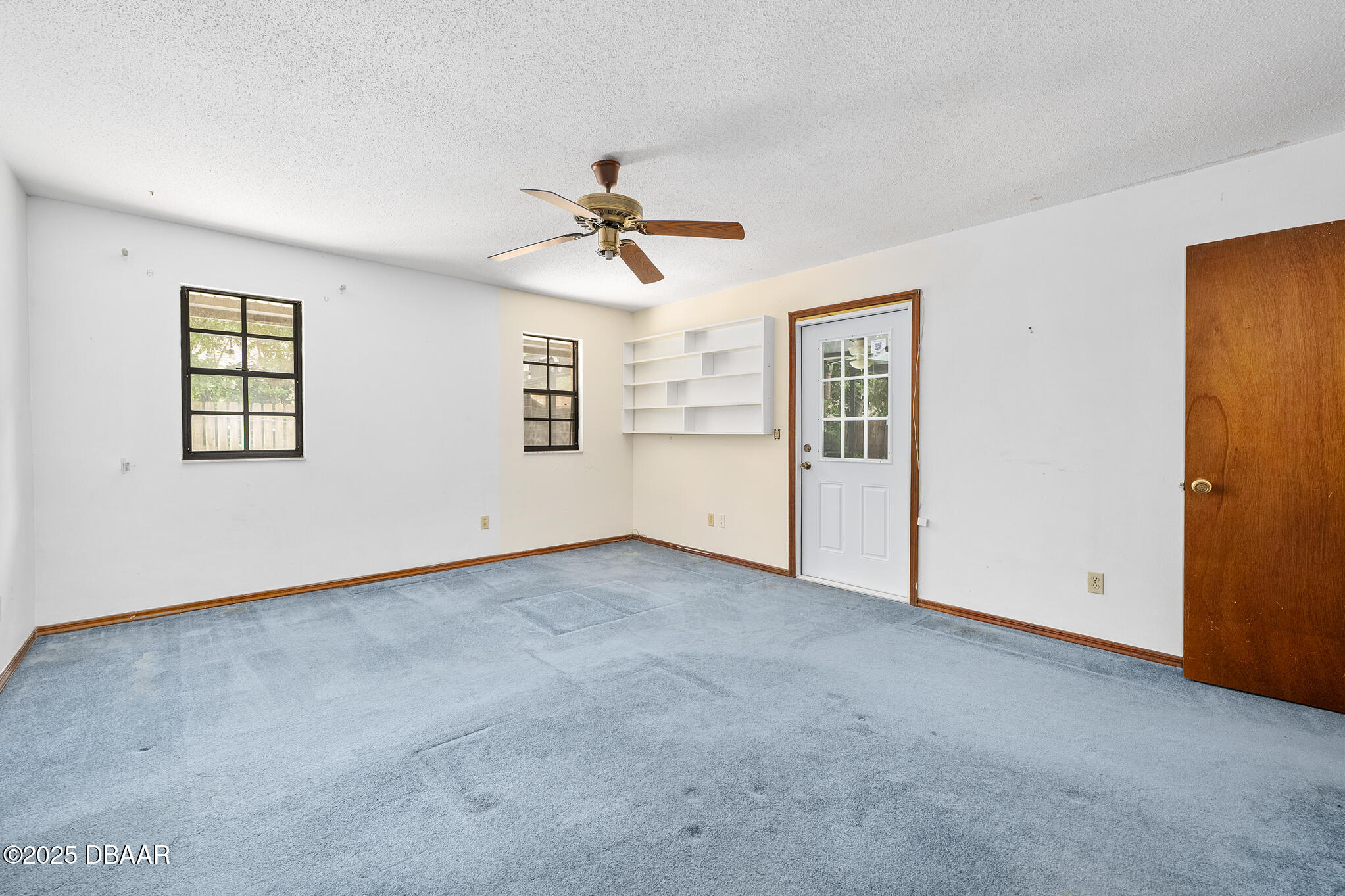 1 River Bluff Court Ormond Beach, FL 32174 - Photo 30 of 58 a view of empty room with windows