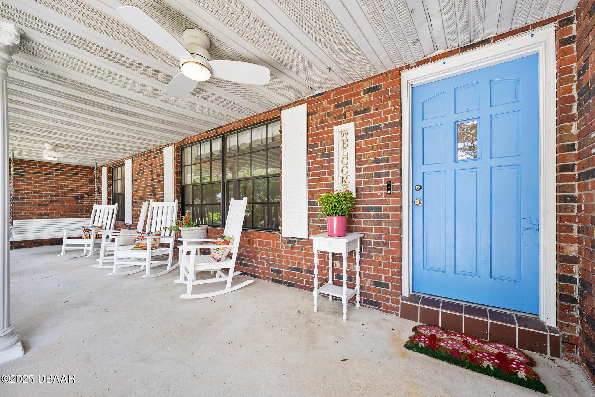 1 River Bluff Court Ormond Beach, FL 32174 - Photo 3 of 58 a living room with furniture and large windows
