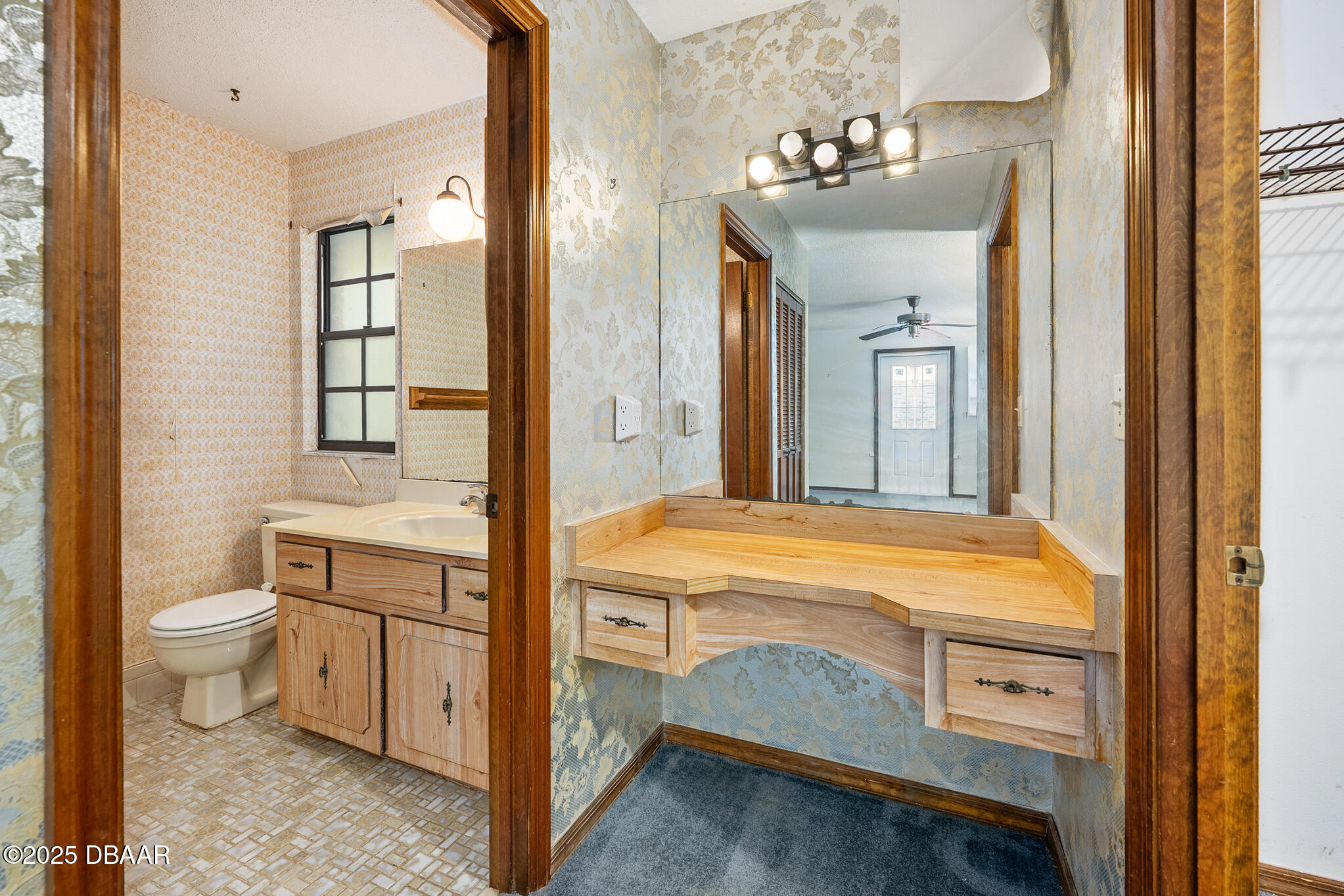 1 River Bluff Court Ormond Beach, FL 32174 - Photo 33 of 58 a bathroom with a sink a toilet and shower