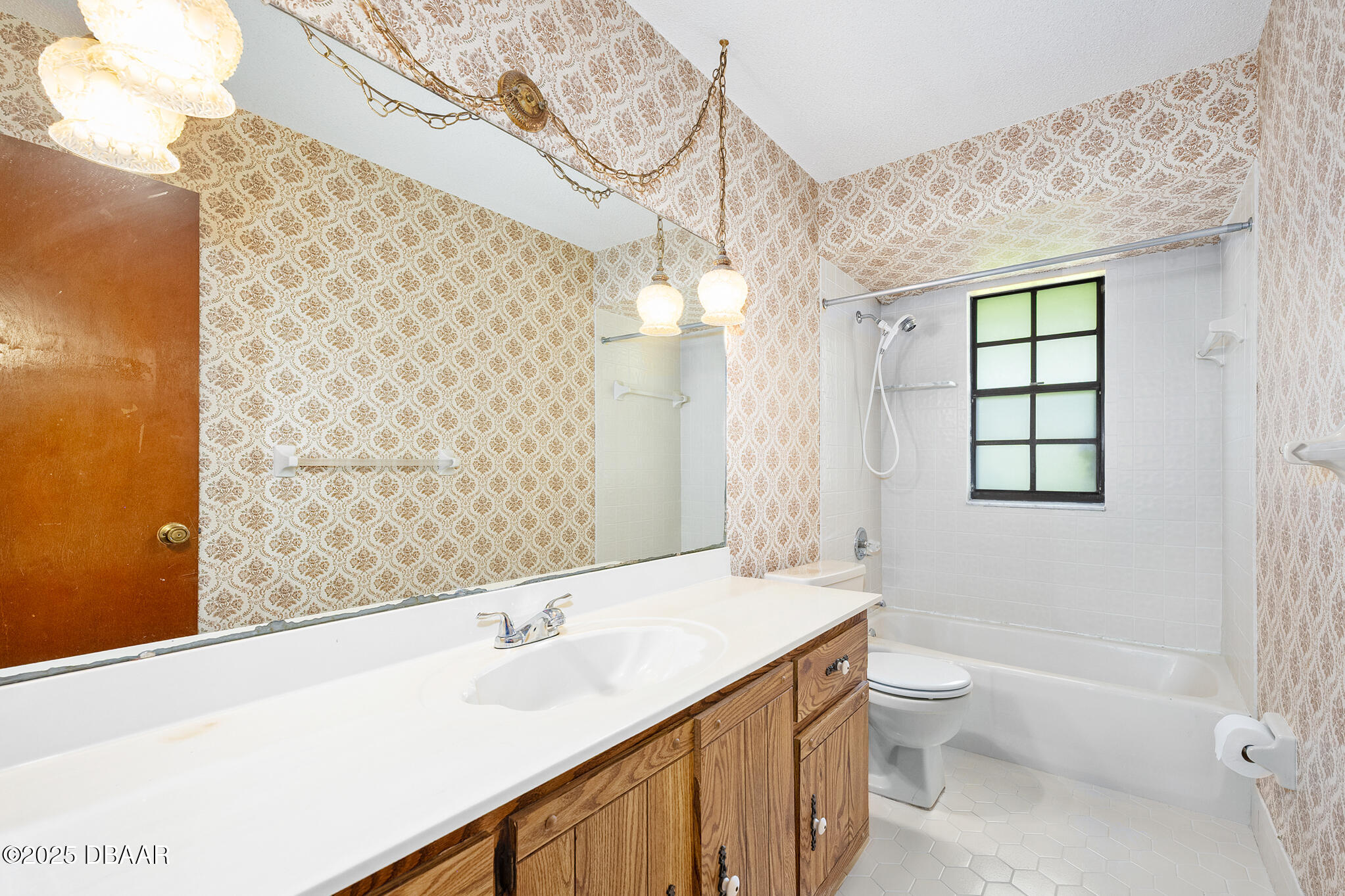 1 River Bluff Court Ormond Beach, FL 32174 - Photo 42 of 58 a bathroom with a sink a toilet and shower