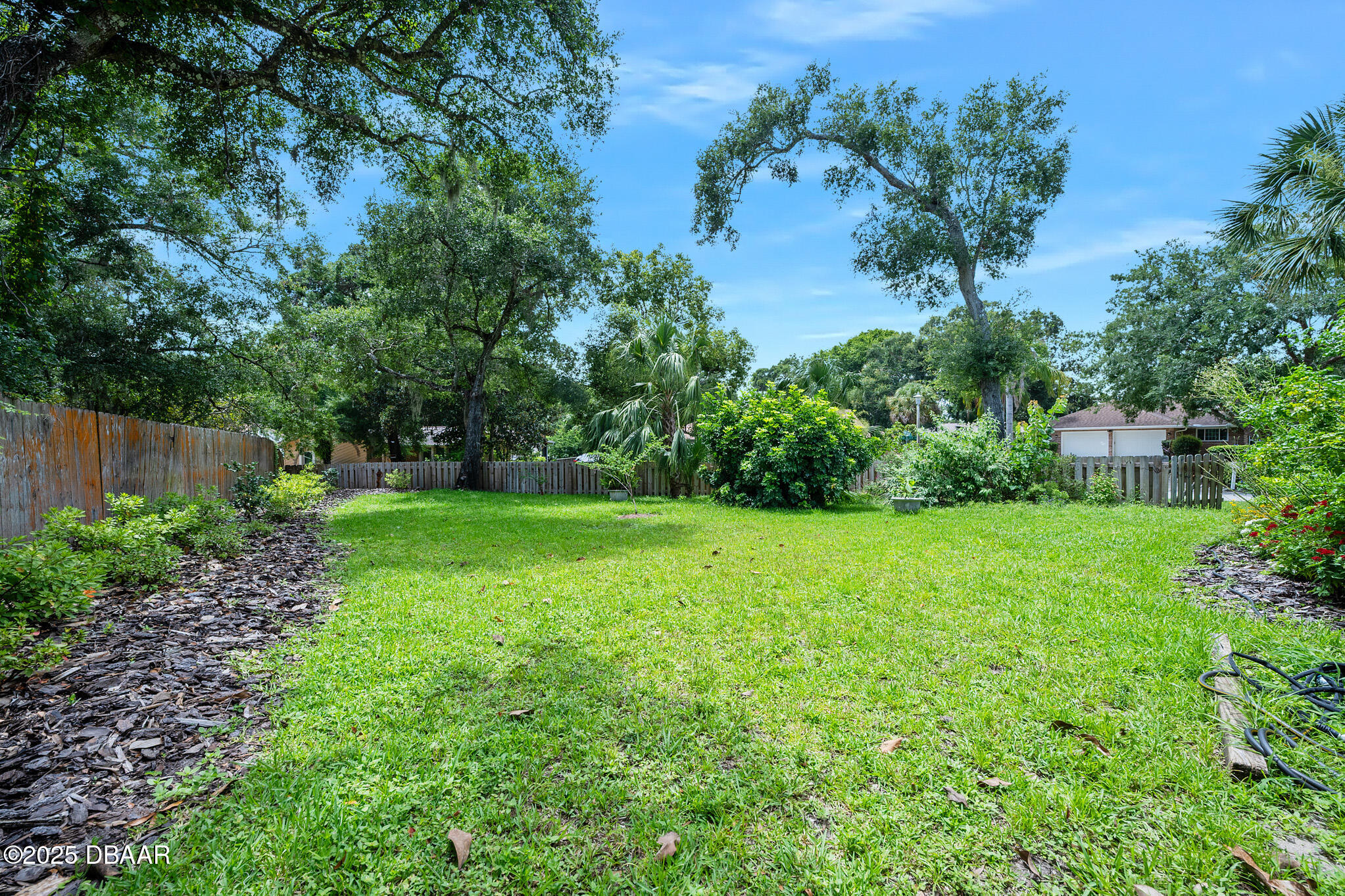 1 River Bluff Court Ormond Beach, FL 32174 - Photo 43 of 58 a view of a yard with a tree