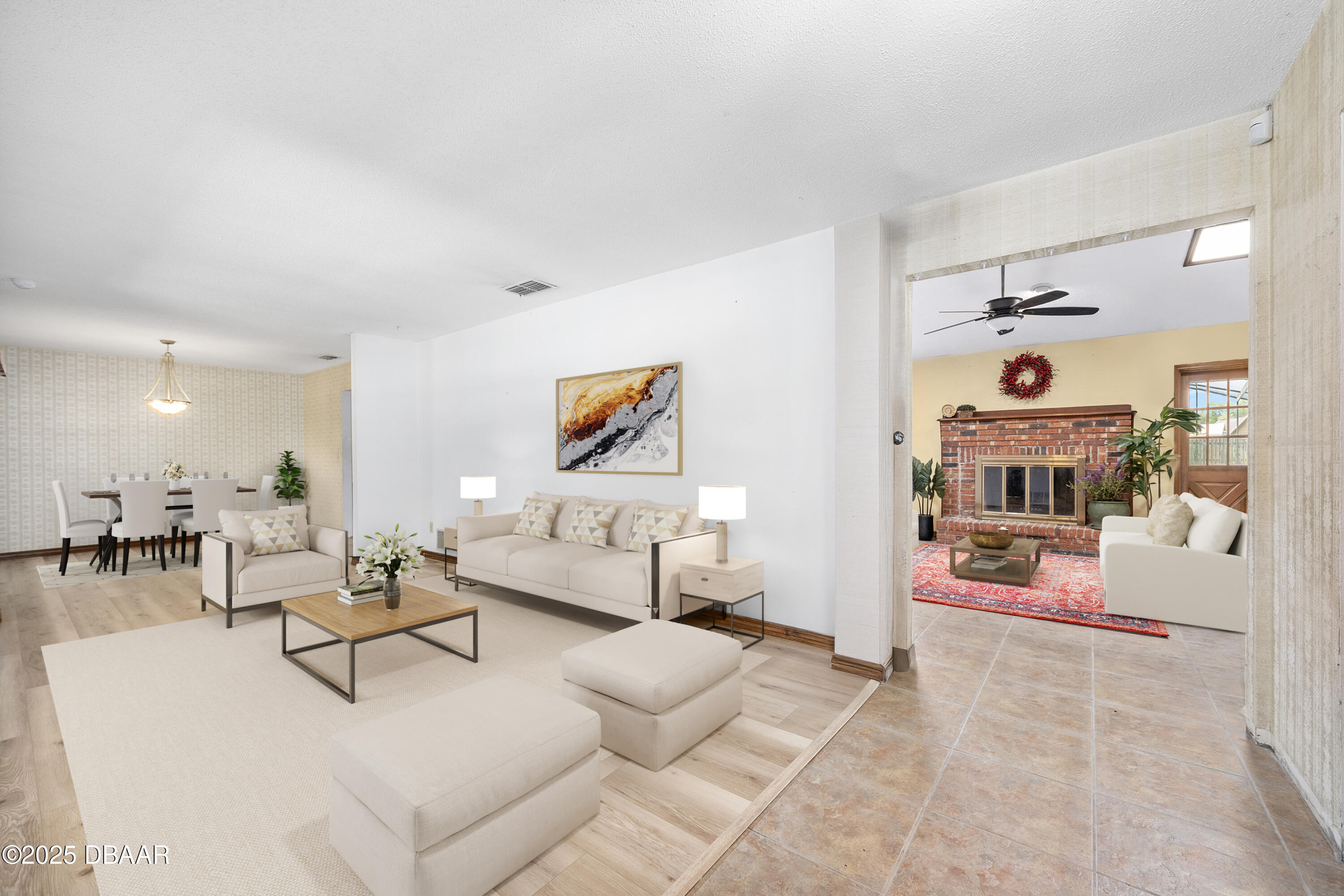 1 River Bluff Court Ormond Beach, FL 32174 - Photo 5 of 58 a living room with furniture and a flat screen tv