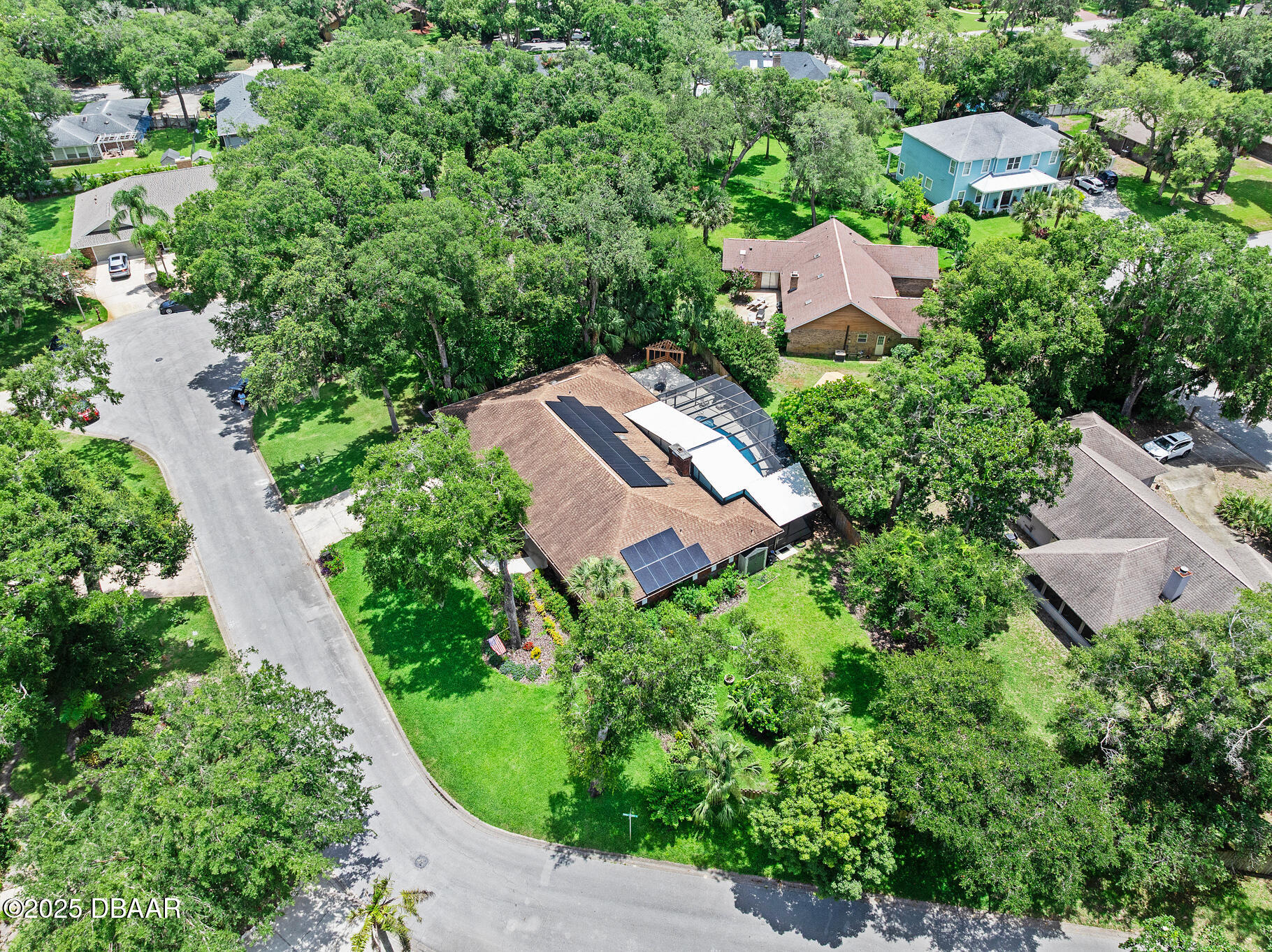 1 River Bluff Court Ormond Beach, FL 32174 - Photo 52 of 58 an aerial view of a house with garden space and street view