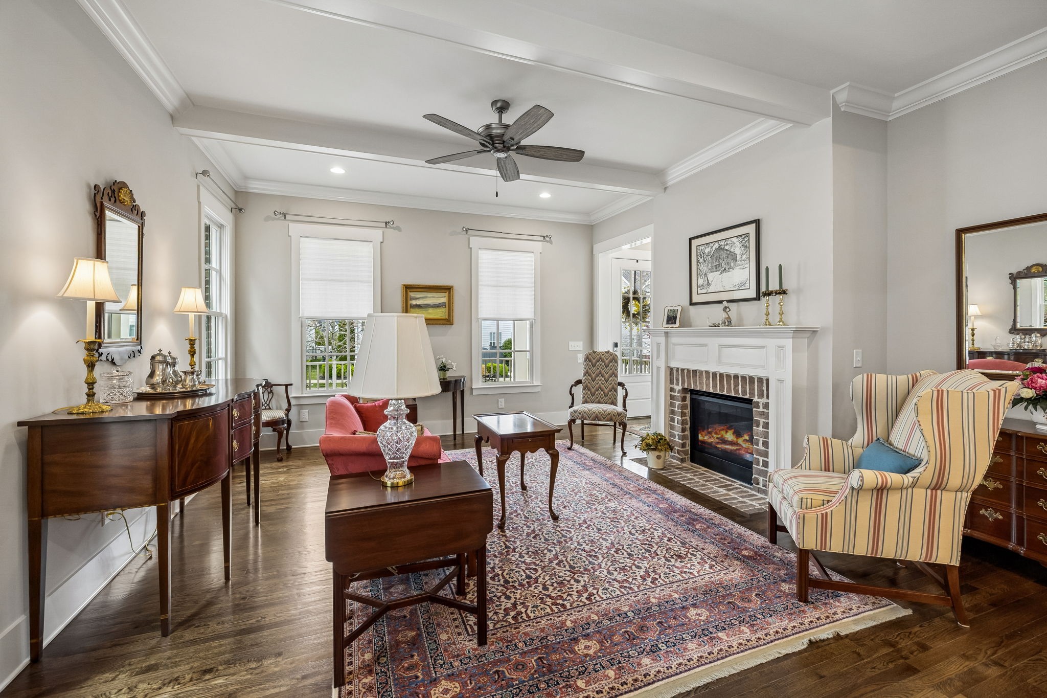 1085 Beckwith Street Franklin, TN 37064 - Photo 12 of 42 a living room with furniture fireplace and a table