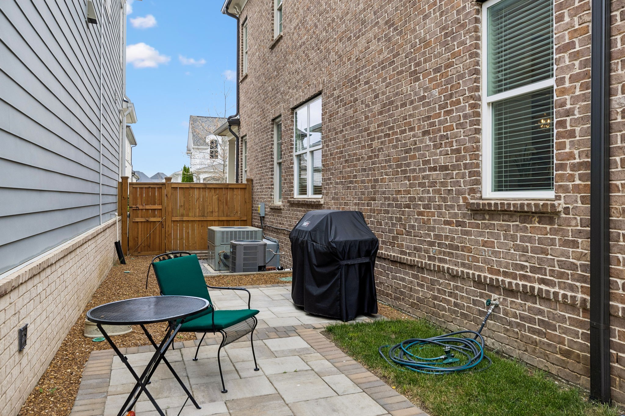 1085 Beckwith Street Franklin, TN 37064 - Photo 39 of 42 a view of a patio with chairs and a potted plant