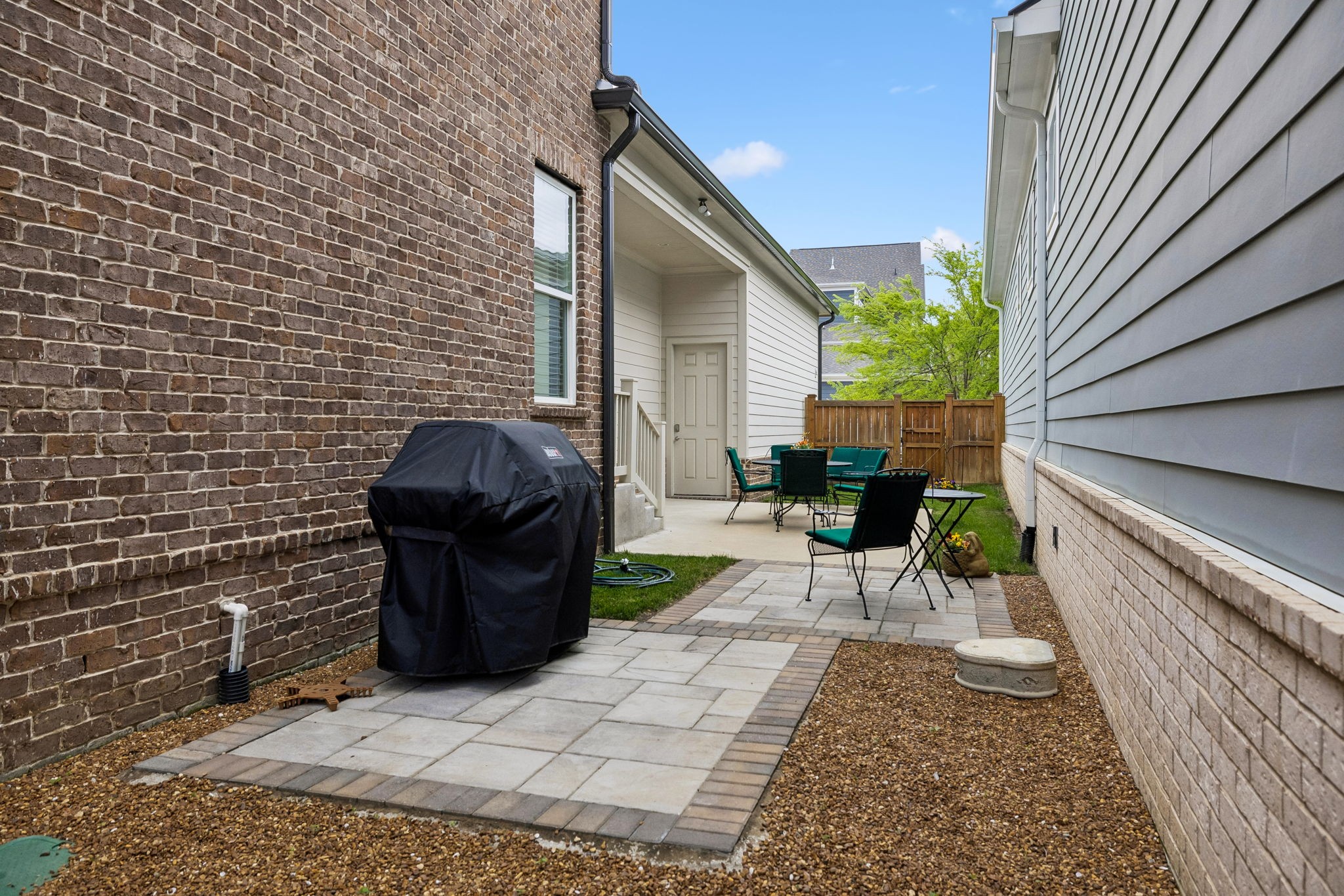 1085 Beckwith Street Franklin, TN 37064 - Photo 40 of 42 a view of a patio with a table and chairs in patio